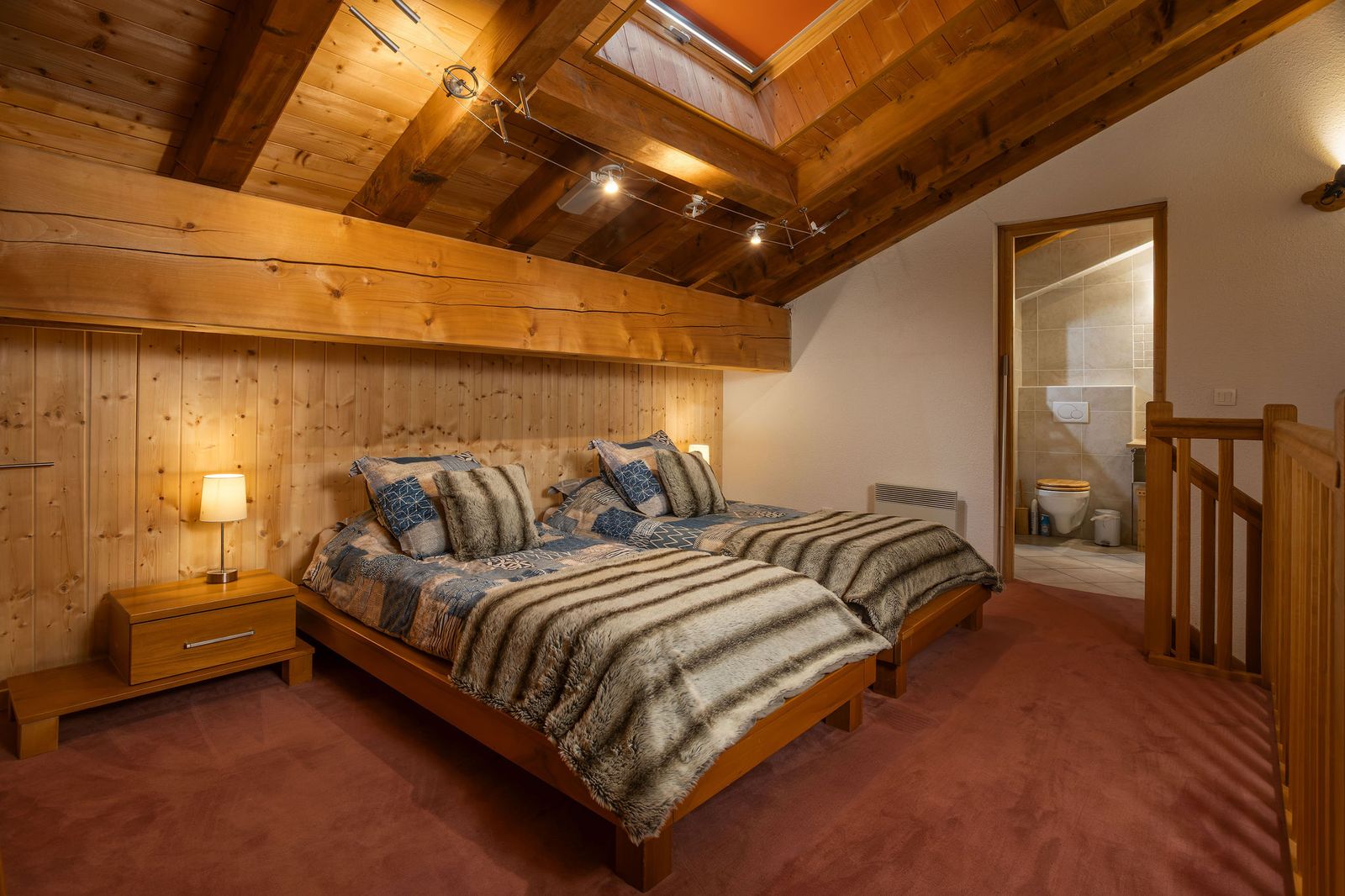 Upper-floor family room with double bed and sofa bed